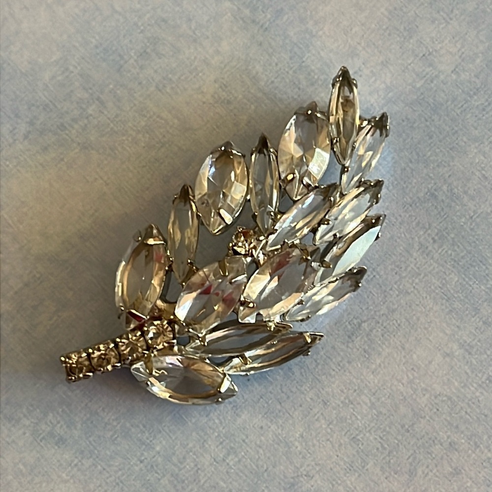 Verified Juliana leaf brooch clear prong set stones and navettes with dark tips
